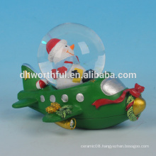 Christmas decoration resin christmas snow globe with snowman figurine in the plane